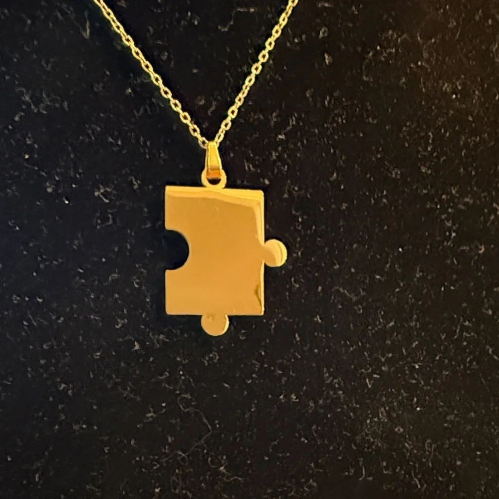 Plunder Gold Colored Puzzle Piece Necklace
